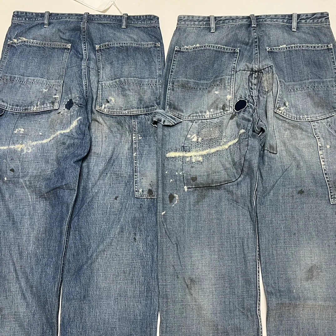 Proofing VS ZP SAINT Mxxxxxx SAINT_DENIM PANTS/PAINTER /BLUE Knife cut holes and splashed ink logging trousers Patch jeans Blue S-XL All accessories are molded and customized Super heavy work Washed and worn Knife cut holes Artificial ink splashed graffiti Genuine version Loose and stylish